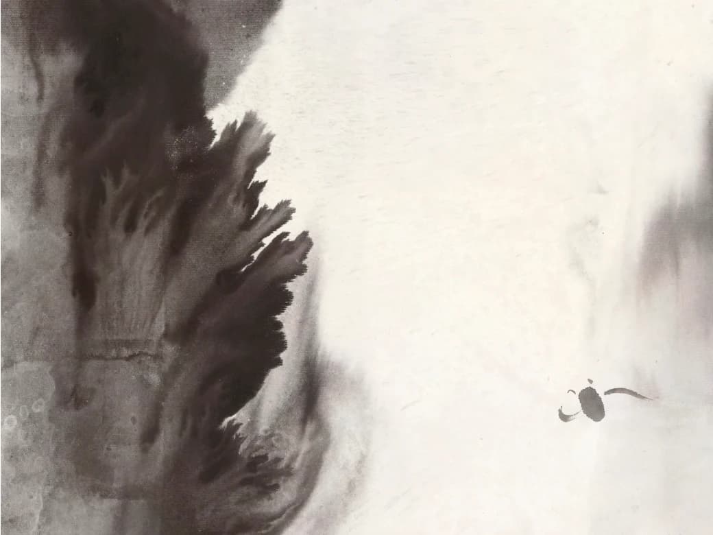 A tall ink painting of a dark, misty mountain on the left and a small fish in the open white space beside it.