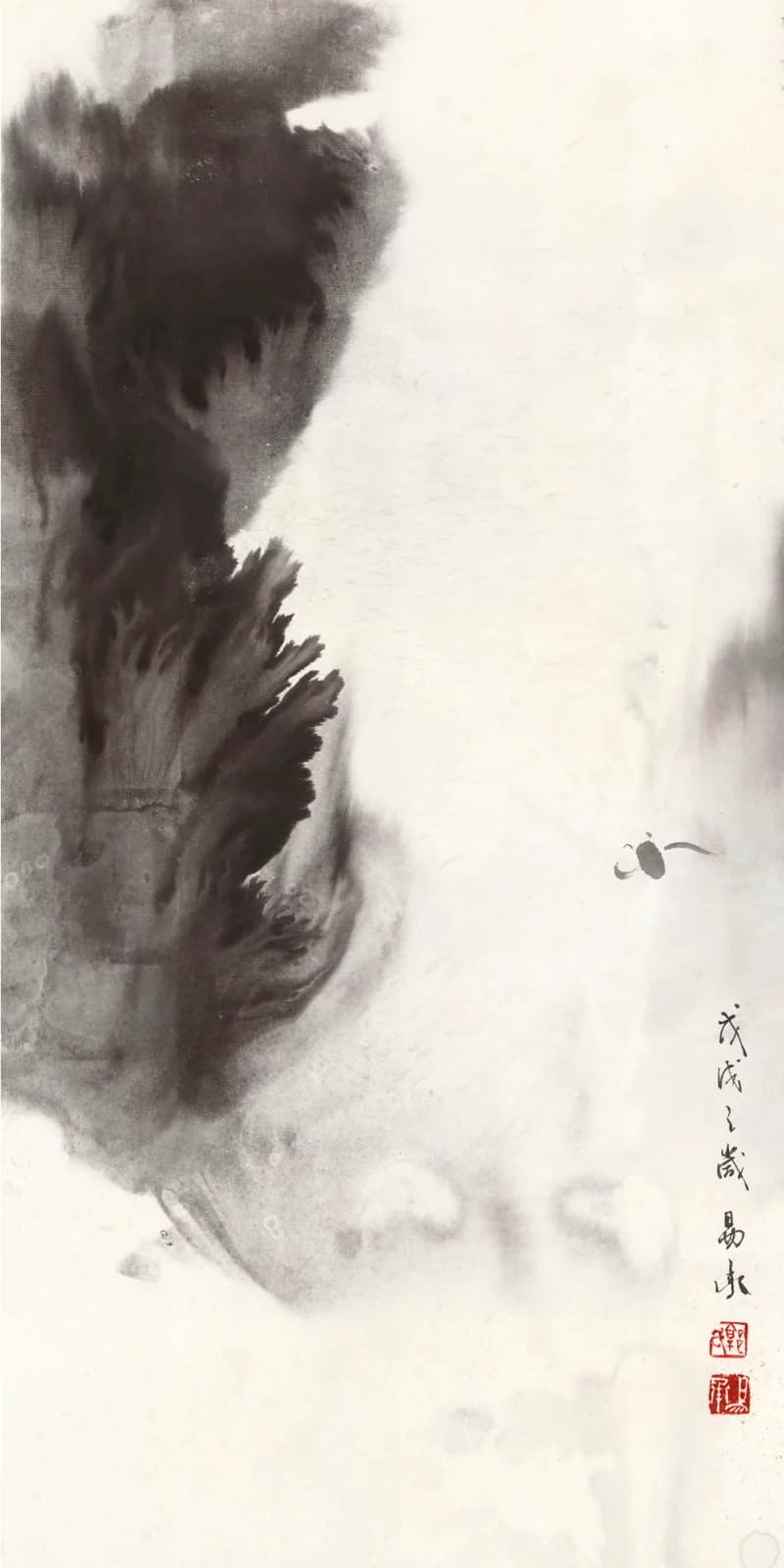 A tall ink painting of a dark, misty mountain on the left and a small fish in the open white space beside it.